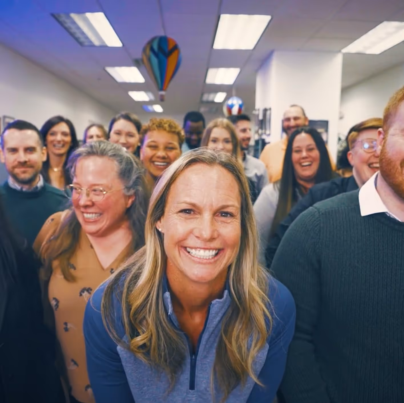 The Tournament Housing Services staff, with Christie Rampone in the middle
